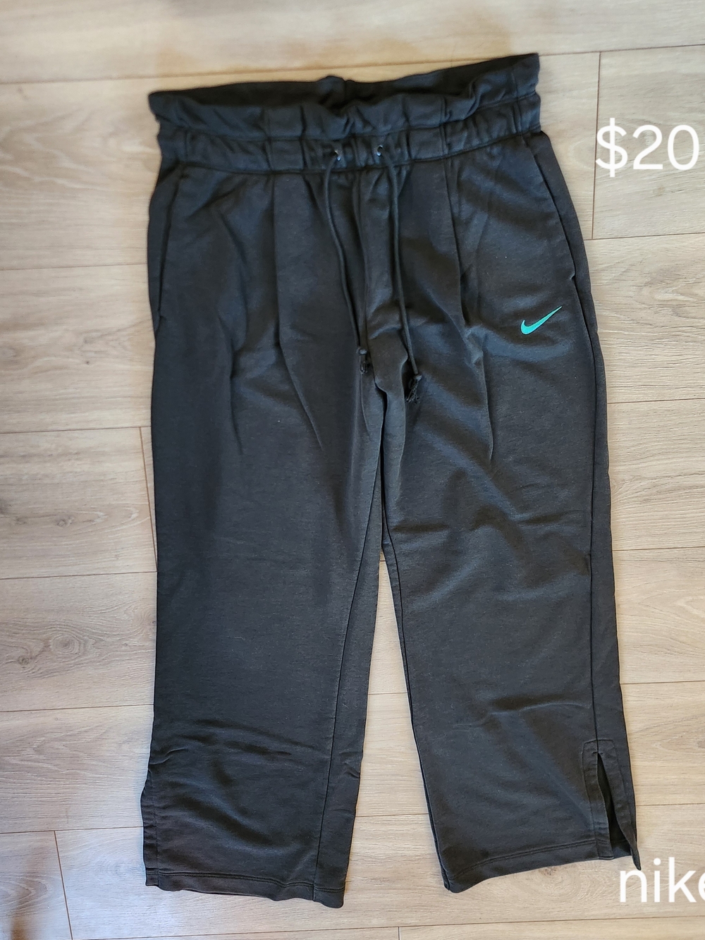 Nike Black Jogger Pants with Teal Swoosh Accent